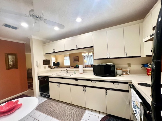 kitchen featuring black appliances, white cabinetry, sink, light tile patterned floors, and crown molding