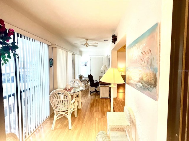 interior space featuring ceiling fan and light hardwood / wood-style floors