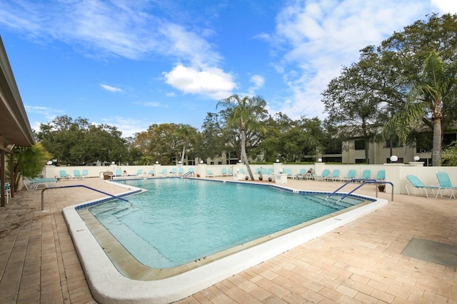 view of pool featuring a patio