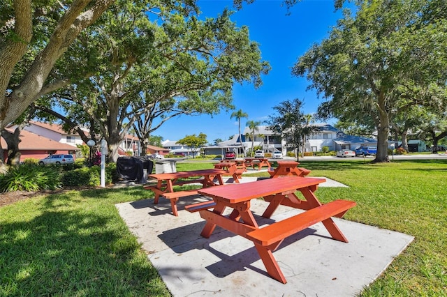 view of community featuring a yard