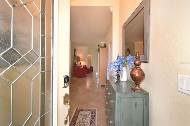 hallway featuring tile patterned flooring