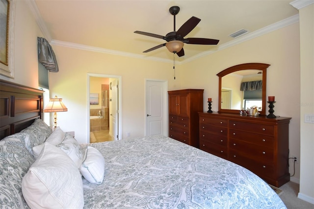 carpeted bedroom featuring ensuite bathroom, ceiling fan, visible vents, and crown molding