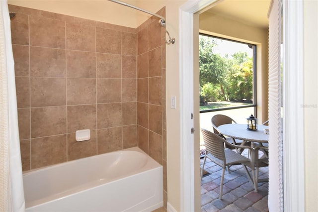 bathroom with shower / tub combo