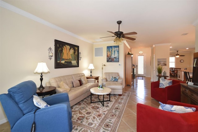 living room featuring light tile patterned floors, ceiling fan, visible vents, and crown molding