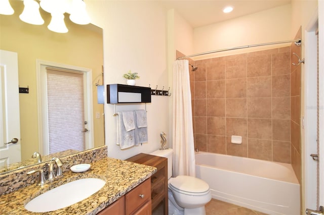 full bathroom with tile patterned flooring, vanity, toilet, and shower / bathtub combination with curtain