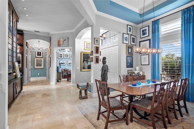 dining room with beam ceiling, ornamental molding, and light tile floors