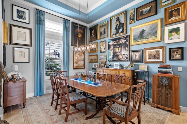 tiled dining space featuring ornamental molding