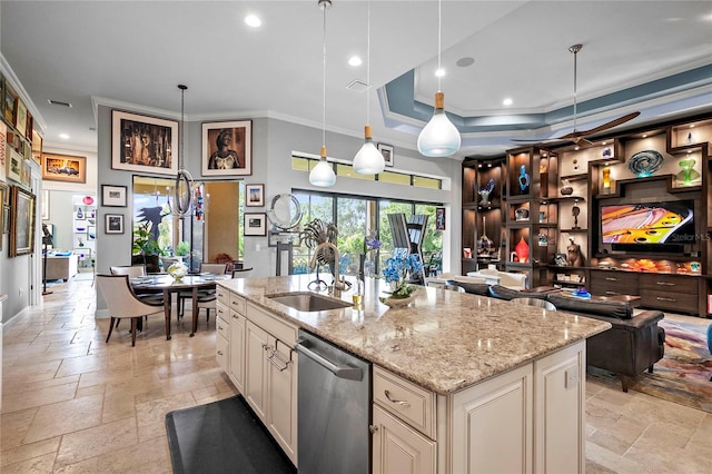 kitchen featuring decorative light fixtures, sink, dishwasher, and light tile floors