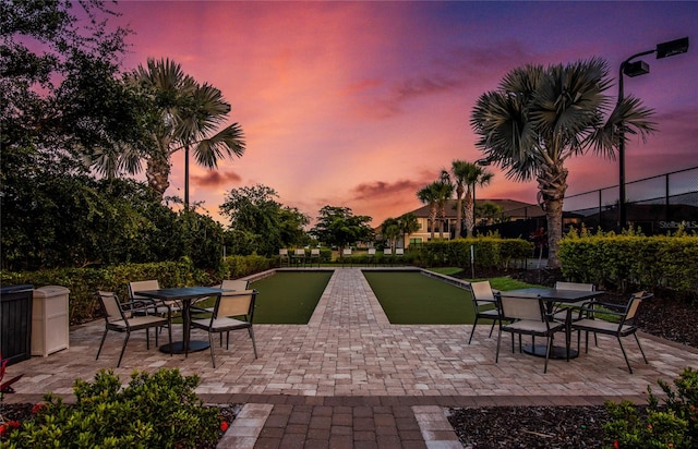 view of patio terrace at dusk