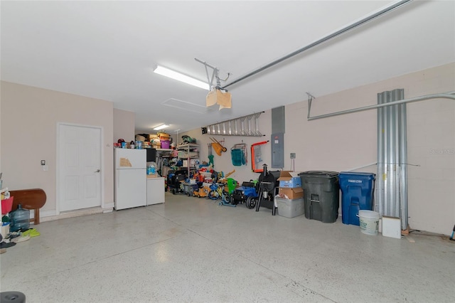 garage with white fridge and electric panel