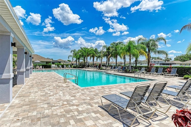 view of swimming pool with a patio area