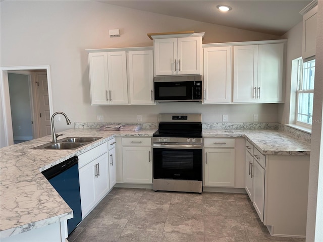 kitchen featuring kitchen peninsula, appliances with stainless steel finishes, sink, white cabinetry, and lofted ceiling