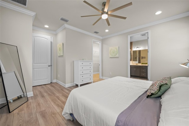 bedroom with ceiling fan, ornamental molding, connected bathroom, and light hardwood / wood-style flooring