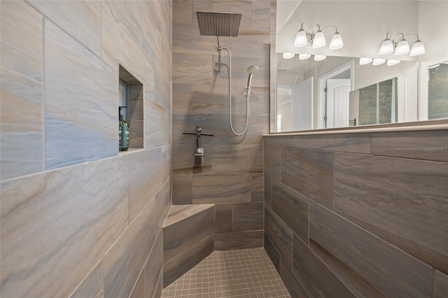 bathroom featuring a tile shower