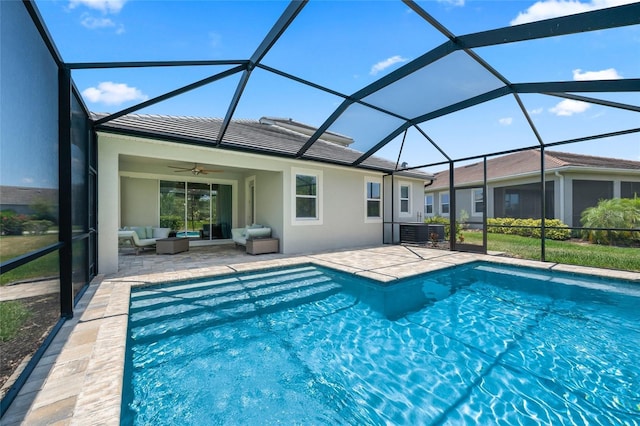 view of pool with a lanai, central air condition unit, an outdoor living space, ceiling fan, and a patio