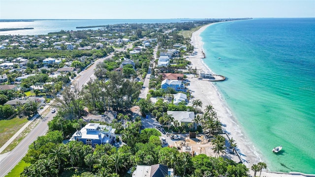 aerial view with a beach view and a water view