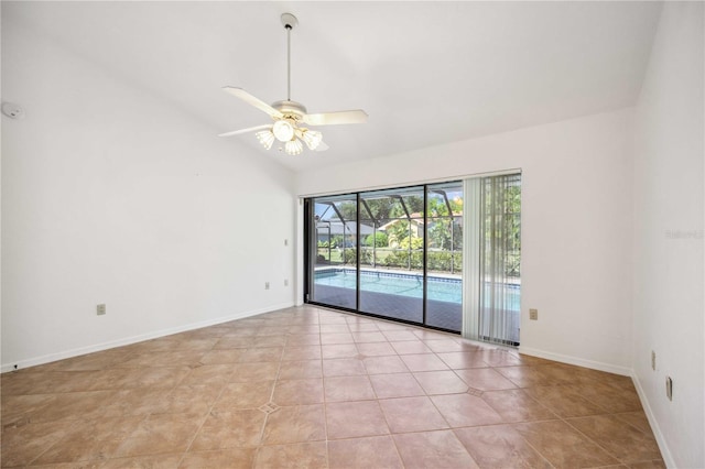 tiled spare room with ceiling fan and lofted ceiling