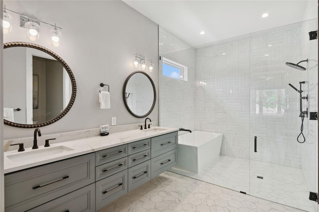 bathroom featuring tile patterned floors, vanity, and independent shower and bath