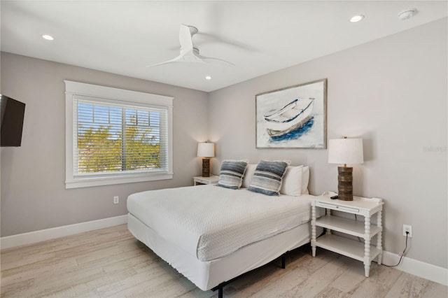 bedroom featuring ceiling fan and light wood-type flooring