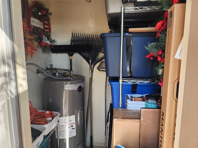 utility room with electric water heater