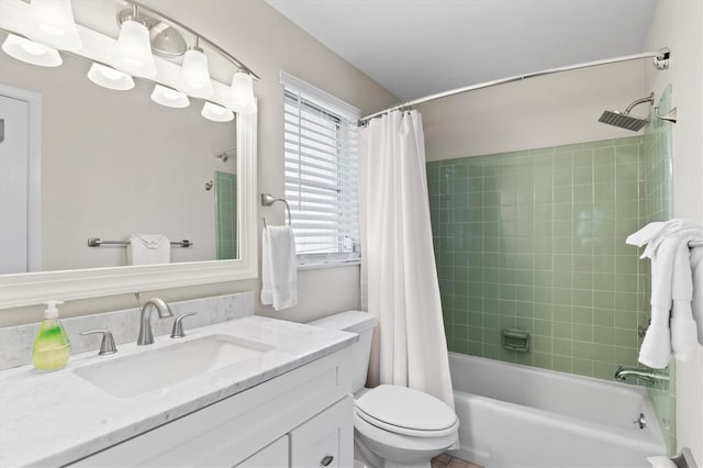 full bathroom with shower / bath combination with curtain, vanity, and toilet