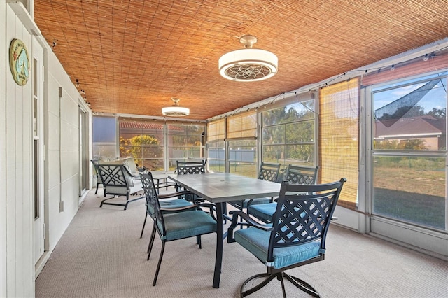 sunroom / solarium with wooden ceiling