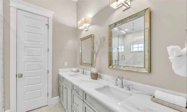 bathroom featuring vanity and a shower with door