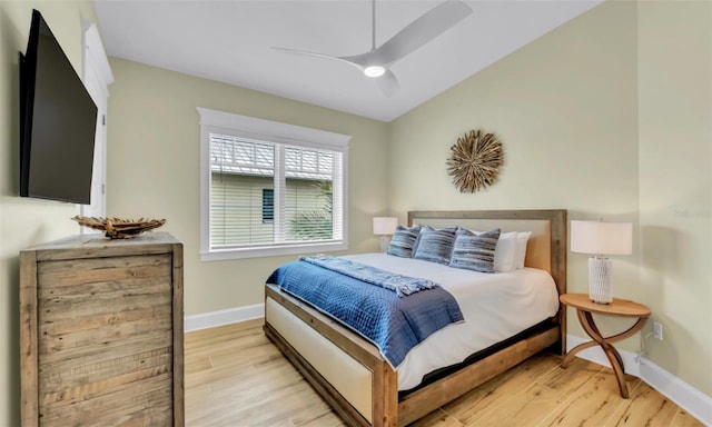 bedroom featuring ceiling fan and light wood-type flooring