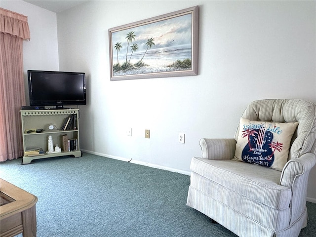 living area with dark carpet