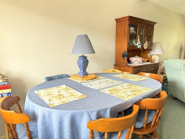 view of carpeted dining space