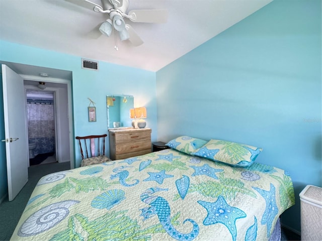 bedroom featuring dark carpet and ceiling fan