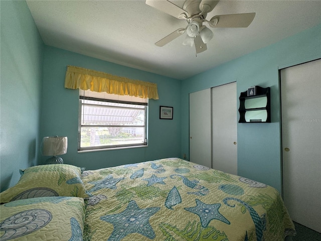 bedroom with a textured ceiling, a closet, and ceiling fan