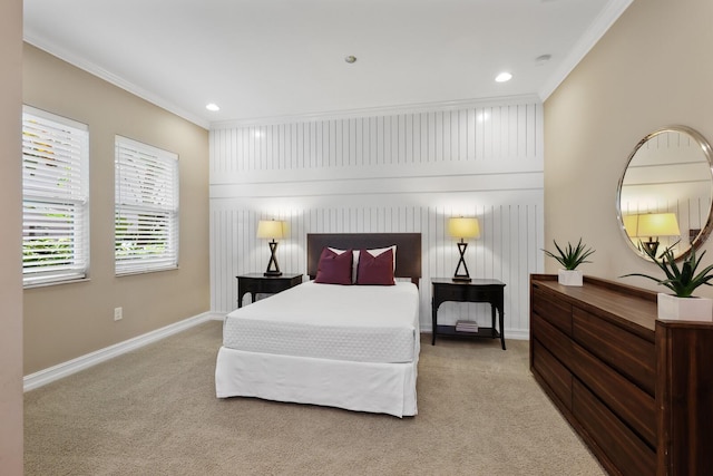 bedroom featuring ornamental molding and light carpet