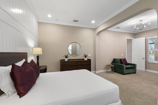 carpeted bedroom with a notable chandelier and ornamental molding