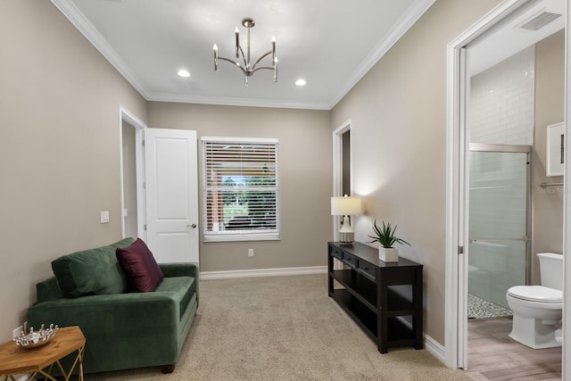 sitting room with light colored carpet, crown molding, and a chandelier