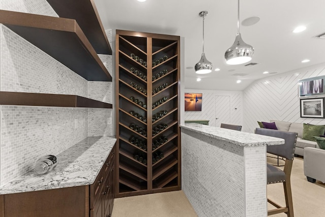 wine cellar with light colored carpet