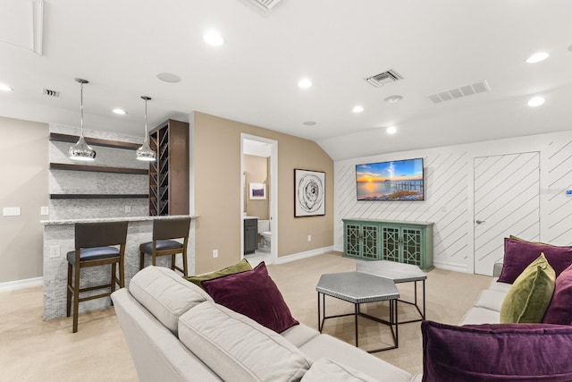 living room with light colored carpet and lofted ceiling