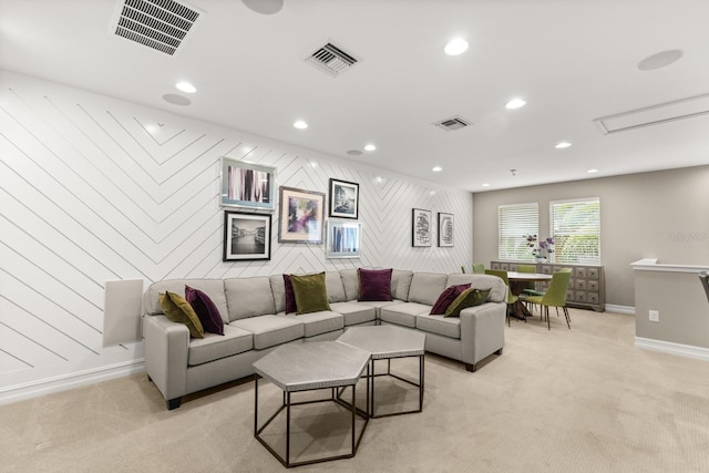 living room featuring light carpet