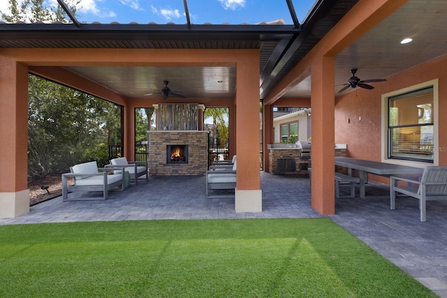 view of patio / terrace featuring an outdoor living space with a fireplace, grilling area, area for grilling, and ceiling fan