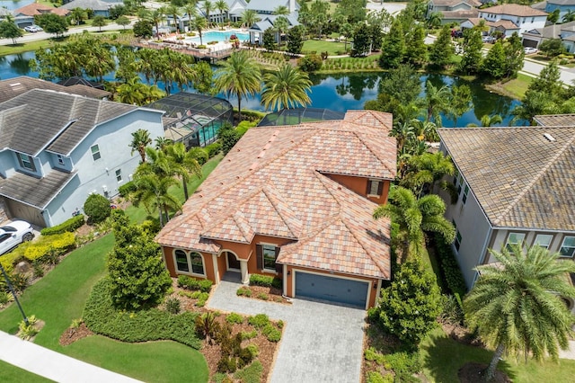 birds eye view of property featuring a water view