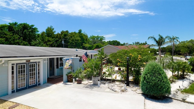 view of patio featuring french doors