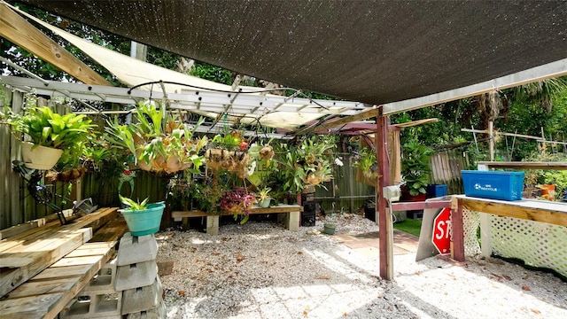 view of patio / terrace featuring fence