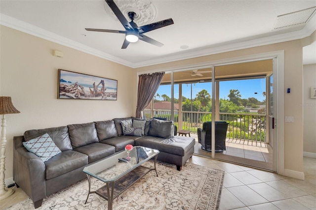 tiled living room featuring ornamental molding and ceiling fan