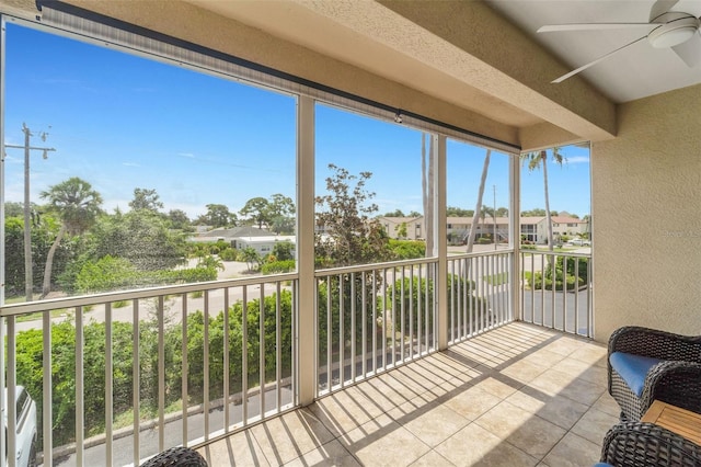 balcony featuring ceiling fan