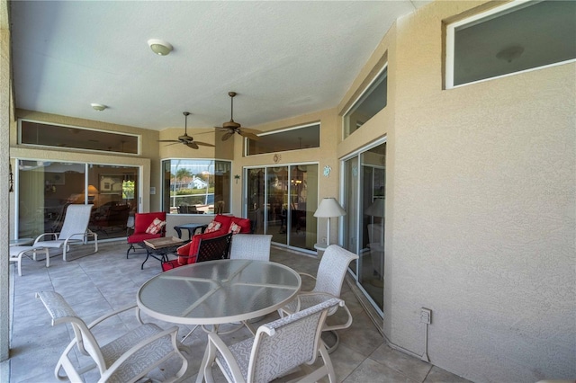 view of patio with ceiling fan