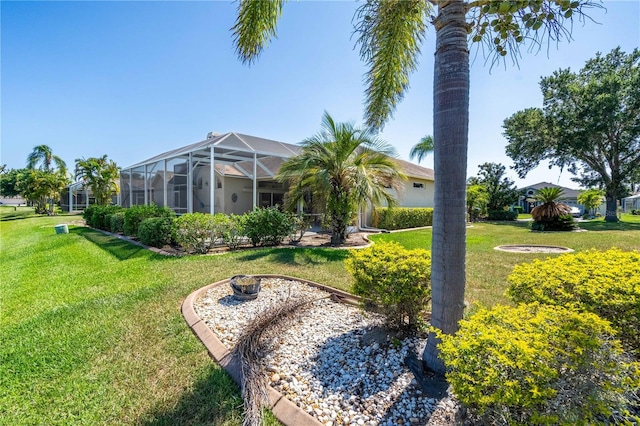 view of yard featuring a lanai