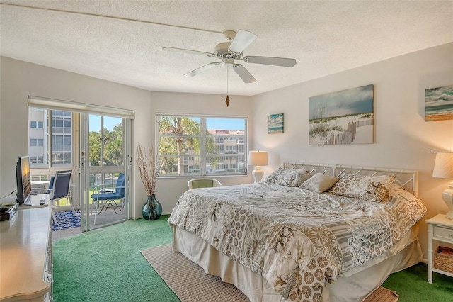 bedroom featuring a ceiling fan, access to outside, a textured ceiling, and carpet