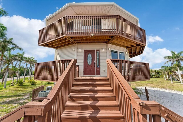 16361 Stringfellow Rd, Bokeelia, FL 33922 - view of front of house featuring a deck