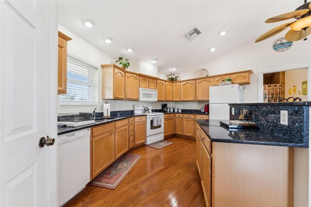 16361 Stringfellow Rd, Bokeelia, FL 33922 - kitchen featuring white appliances, lofted ceiling, dark wood-style flooring, a ceiling fan, and a sink