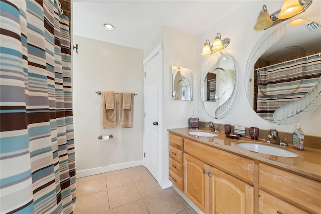 16361 Stringfellow Rd, Bokeelia, FL 33922 - bathroom featuring tile patterned floors, double vanity, recessed lighting, baseboards, and curtained shower